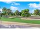 Picture of the golf course shows luscious green fairways and mature trees at 2160 Pueblo Cir, Las Vegas, NV 89169