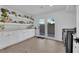 Bright laundry room boasts ample counter space, floating shelves, and outdoor access at 2160 Pueblo Cir, Las Vegas, NV 89169