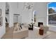 Bright living room with fireplace, large windows, and elegant decor at 2160 Pueblo Cir, Las Vegas, NV 89169