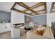 Living room with coffered ceiling, fireplace, and wet bar for modern living at 2160 Pueblo Cir, Las Vegas, NV 89169