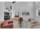 Open-concept living room with a bar and view into the kitchen at 2160 Pueblo Cir, Las Vegas, NV 89169