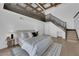 Large main bedroom with high ceilings, wood beams and staircase at 2160 Pueblo Cir, Las Vegas, NV 89169