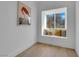 Bright sitting area with a window seat, decorative pillows, and a view of the outdoors at 2160 Pueblo Cir, Las Vegas, NV 89169