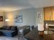Relaxing living room with comfortable seating, dining area, and granite countertops at 260 E Flamingo Rd # 228, Las Vegas, NV 89169