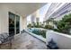 Balcony overlooking city views and tropical palm trees with a shared outdoor pool at 2747 Paradise Rd # 206, Las Vegas, NV 89109