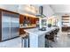 Modern kitchen featuring stainless steel appliances, a large island with seating, and stylish cabinetry at 2747 Paradise Rd # 206, Las Vegas, NV 89109