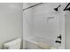 Bright bathroom with a tiled shower and bathtub combination and modern fixtures at 2848 Skowhegan Dr, Henderson, NV 89074