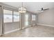 Open dining space with large windows, tile floors and views of the outdoor pool at 2848 Skowhegan Dr, Henderson, NV 89074