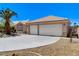 Attractive single-story home with a two-car garage, complemented by low-maintenance desert landscaping at 2848 Skowhegan Dr, Henderson, NV 89074