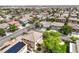 Neighborhood aerial view showcasing lush landscaping and well-maintained homes at 3065 Blue Monaco St, Las Vegas, NV 89117
