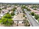 Neighborhood aerial view showing street and backyards in a suburban area at 3065 Blue Monaco St, Las Vegas, NV 89117