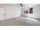 Bright and airy bedroom with neutral walls and a ceiling fan at 3065 Blue Monaco St, Las Vegas, NV 89117