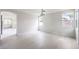 Light-filled living room with wood floors and a view of the entryway at 3065 Blue Monaco St, Las Vegas, NV 89117