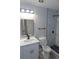 Modern bathroom with sleek vanity, a framed mirror, and a glass enclosed shower at 3219 Bluebird St, Las Vegas, NV 89121