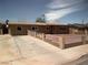 Charming single-story home with a well-maintained yard and white picket fence at 3219 Bluebird St, Las Vegas, NV 89121