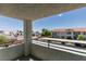 Balcony view overlooking nearby apartments and covered parking at 3318 N Decatur Blvd # 2110, Las Vegas, NV 89130
