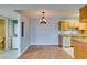 Dining area with wood floors and kitchen access at 3318 N Decatur Blvd # 2110, Las Vegas, NV 89130