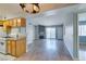 Inviting living room with fireplace, sliding glass door, and kitchen access at 3318 N Decatur Blvd # 2110, Las Vegas, NV 89130