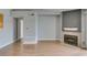 Living room features wood flooring, fireplace, and neutral color palette at 3318 N Decatur Blvd # 2110, Las Vegas, NV 89130