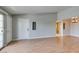 Bright, open living room with wood floors, neutral paint, and ample natural light at 3318 N Decatur Blvd # 2110, Las Vegas, NV 89130