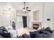 Comfortable living room showcasing a fireplace and access to the outdoor space at 3515 Cactus Shadow St # 104, Las Vegas, NV 89129