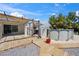 Discover a backyard with an above-ground pool, mature trees, and a wooden path perfect for relaxation and outdoor gatherings at 3581 Mallard Ave, Pahrump, NV 89048