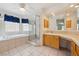 The primary bathroom offers a separate shower, soaking tub, and updated vanity at 3581 Mallard Ave, Pahrump, NV 89048