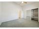 A bright bedroom includes new carpet, a ceiling fan, and a mirrored closet at 3581 Mallard Ave, Pahrump, NV 89048