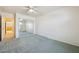 Empty bedroom features a mirrored closet and carpet at 3581 Mallard Ave, Pahrump, NV 89048