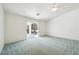 Spacious bedroom with a ceiling fan and sliding glass door at 3581 Mallard Ave, Pahrump, NV 89048