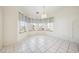 Breakfast nook area features multiple windows and tile floor at 3581 Mallard Ave, Pahrump, NV 89048
