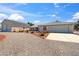 Spacious home with solar panels on the detached garage and circular driveway at 3581 Mallard Ave, Pahrump, NV 89048