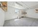 The garage offers ample space, shelving, and a window, providing an ideal spot for hobbies or projects at 3581 Mallard Ave, Pahrump, NV 89048