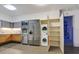 Modern kitchen featuring stainless steel appliances, sleek cabinetry, and a convenient in-unit washer/dryer setup at 3726 Las Vegas Blvd # 1902, Las Vegas, NV 89158