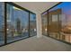 Minimalist style living room featuring floor to ceiling windows with city views at 3726 Las Vegas Blvd # 1902, Las Vegas, NV 89158