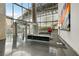 Modern condo lobby with floor-to-ceiling windows offers ample natural light and city views at 3726 Las Vegas Blvd # 1902, Las Vegas, NV 89158