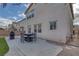 Wonderful backyard with an outdoor dining set, patio, and landscaping great for entertaining guests at 3964 Irvin Ave, Las Vegas, NV 89141