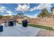 Landscaped backyard featuring patio, dining, grill, and block wall at 3964 Irvin Ave, Las Vegas, NV 89141