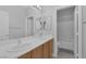 Bathroom featuring double sinks, vanity, mirror, and neutral color palette at 3964 Irvin Ave, Las Vegas, NV 89141