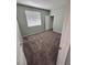 Carpeted bedroom with neutral wall and window with blinds allowing plenty of natural light at 3964 Irvin Ave, Las Vegas, NV 89141