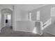 Bright hallway with natural light and neutral color palette creates a seamless transition between rooms at 3964 Irvin Ave, Las Vegas, NV 89141