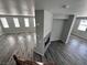View from the top of the stairs to the living room with fireplace at 3964 Irvin Ave, Las Vegas, NV 89141