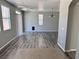 Bright living room features hardwood floors, grey walls, and ample natural light at 3964 Irvin Ave, Las Vegas, NV 89141