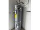Photo of a modern-looking electric water heater, complete with associated plumbing fixtures at 4189 Studio St, Las Vegas, NV 89115