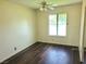 Bedroom showcasing hardwood flooring and natural light at 4437 Sherrill Ave, Las Vegas, NV 89110