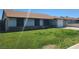 A ranch-style home showcasing a green lawn, driveway, and attached garage at 4437 Sherrill Ave, Las Vegas, NV 89110