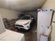 A two car garage interior, providing storage and parking, with car inside at 4437 Sherrill Ave, Las Vegas, NV 89110