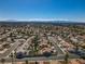Expansive aerial view of a residential community with single-Gathering homes and well-maintained streets at 4653 Califa Dr, Las Vegas, NV 89122