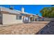 The spacious backyard features low maintenance desert landscaping with perimeter block wall at 4653 Califa Dr, Las Vegas, NV 89122