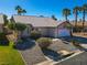 Charming single-story home features a well-maintained front yard with desert landscaping and a two-car garage at 4653 Califa Dr, Las Vegas, NV 89122